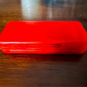 Three Nintendo Switch games and travel case